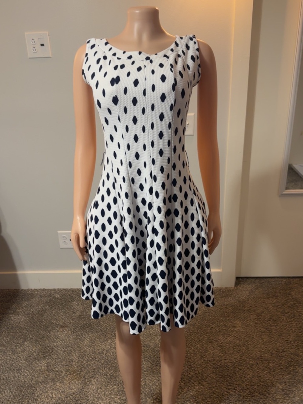 Sleeveless White and Navy Polka Dot Fit-and-Flare Dress